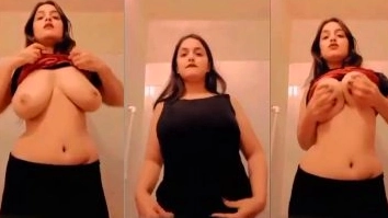 A Big Boob Girl Displays Her Wealth in the Nude