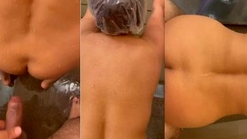 In the shower, a man his girlfriend.